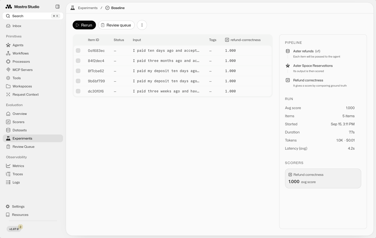 Mastra Studio experiments page showing a scorer run over five items